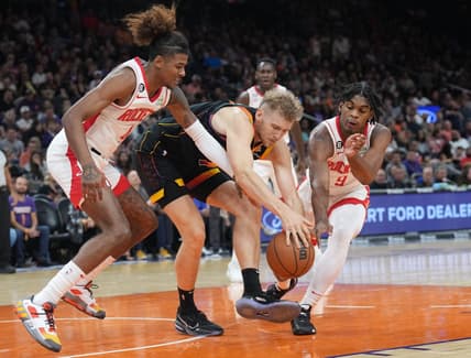 Oct 30, 2022; Phoenix, Arizona, USA; Houston Rockets guard Jalen Green (4) and Phoenix Suns center Jock Landale (11) and Houston Rockets guard Josh Christopher (9) go after a loose ball during the first half at Footprint Center. Mandatory Credit: Joe Camporeale-USA TODAY Sports