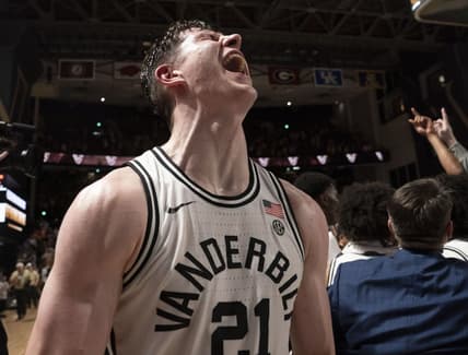 Feb 8, 2023; Nashville, Tennessee, USA;   Vanderbilt Commodores forward Liam Robbins (21) celebrates after defeating the Tennessee Volunteers 66 to 65 at Memorial Gymnasium.  Mandatory Credit: George Walker IV - USA TODAY Sports
