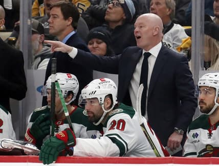Dec 18, 2023; Pittsburgh, Pennsylvania, USA;  Minnesota Wild head coach John Hynes gestures from the bench against the Pittsburgh Penguins during the third period at PPG Paints Arena. Pittsburgh won 4-3. Mandatory Credit: Charles LeClaire-USA TODAY Sports
