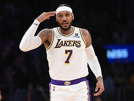 Dec 12, 2021; Los Angeles, California, USA; Los Angeles Lakers forward Carmelo Anthony (7) heads down court after a 3-point basket in the game against the Orlando Magic at Staples Center. Mandatory Credit: Jayne Kamin-Oncea-USA TODAY Sports