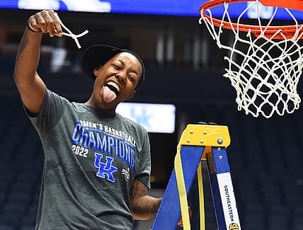 Mar 6, 2022; Nashville, TN, USA; Kentucky Wildcats forward Dre'una Edwards (44) celebrates after cutting a piece of the net after beating the South Carolina Gamecocks at Bridgestone Arena. Mandatory Credit: Christopher Hanewinckel-USA TODAY Sports