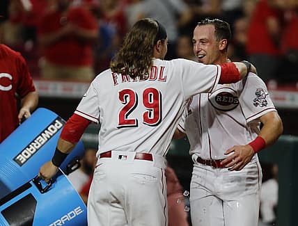 Sep 2, 2022; Cincinnati, Ohio, USA; Sep 2, 2022; Cincinnati, Ohio, USA; Cincinnati Reds third baseman Spencer Steer (right) reacts with outfielder TJ Friedl (29) after Steer scored the winning run against the Colorado Rockies at Great American Ball Park. Mandatory Credit: David Kohl-USA TODAY Sports