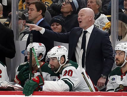 Dec 18, 2023; Pittsburgh, Pennsylvania, USA;  Minnesota Wild head coach John Hynes gestures from the bench against the Pittsburgh Penguins during the third period at PPG Paints Arena. Pittsburgh won 4-3. Mandatory Credit: Charles LeClaire-USA TODAY Sports