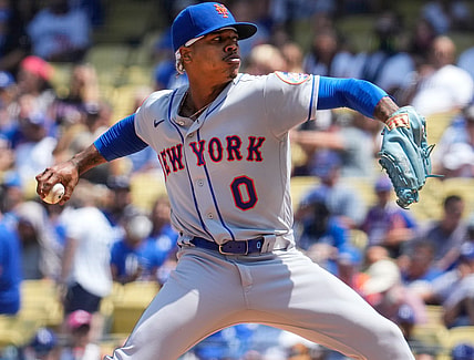 Aug 22, 2021; Los Angeles, California, USA; New York Mets starting pitcher Marcus Stroman (0) throws a pitch in the first inning against the Los Angeles Dodgers at Dodger Stadium. Mandatory Credit: Robert Hanashiro-USA TODAY Sports