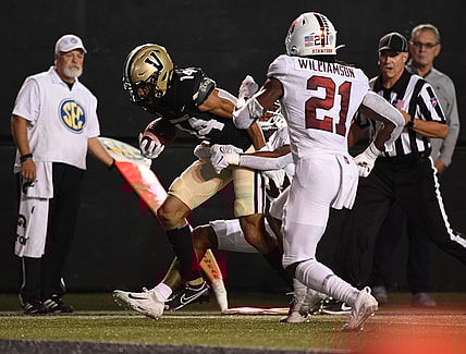 Sep 18, 2021; Nashville, Tennessee, USA; Vanderbilt Commodores wide receiver Will Sheppard (14) runs for a first down after a reception during the first half against the Stanford Cardinal at Vanderbilt Stadium. Mandatory Credit: Christopher Hanewinckel-USA TODAY Sports