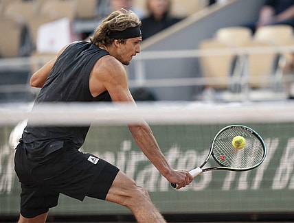 May 31, 2022; Paris, France; Alexander Zverev (GER) returns a shot during his  match against Carlos Alcaraz (ESP) on day 10 of the French Open at Stade Roland-Garros. Mandatory Credit: Susan Mullane-USA TODAY Sports