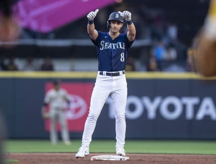 Aug 8, 2023; Seattle, Washington, USA; Seattle Mariners left fielder  Dominic Canzone (8) celebrates after hitting a single during the second inning against the San Diego Padres at T-Mobile Park. Mandatory Credit: Stephen Brashear-USA TODAY Sports