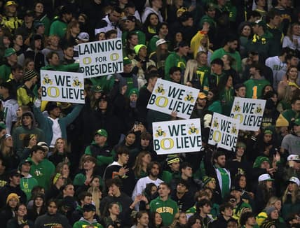 Duck fans show their support for Oregon quarterback Bo Nix and coach Dan Lanning during the game against Oregon State.