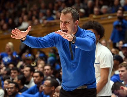 Dec 9, 2023; Durham, North Carolina, USA;  Duke Blue Devils head coach Jon Scheyer reacts to a call during the second half against the Charlotte 49ers at Cameron Indoor Stadium. Mandatory Credit: Rob Kinnan-USA TODAY Sports