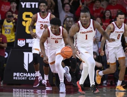 Dec 10, 2023; Los Angeles, California, USA; USC Trojans guard Bronny James (6) pushes the ball up court during the 2nd half against the Long Beach State 49ers at Galen Center. USC Trojans forward Joshua Morgan (24), guard Isaiah Collier (1) and USC Trojans guard Kobe Johnson (0) are also in the play. Mandatory Credit: Robert Hanashiro-USA TODAY Sports