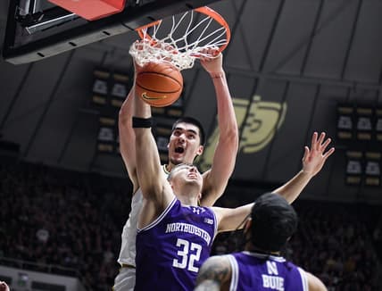 Jan 31, 2024; West Lafayette, Indiana, USA; Purdue Boilermakers center Zach Edey (15) dunks the ball on Northwestern Wildcats forward Blake Preston (32) during the second half at Mackey Arena. Mandatory Credit: Robert Goddin-USA TODAY Sports