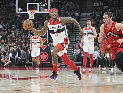 Oct 20, 2021; Toronto, Ontario, CAN; Washington Wizards guard Bradley Beal (3) dribbles away from Toronto Raptors guard Goran Dragic (1) during the first half at Scotiabank Arena. Mandatory Credit: John E. Sokolowski-USA TODAY Sports