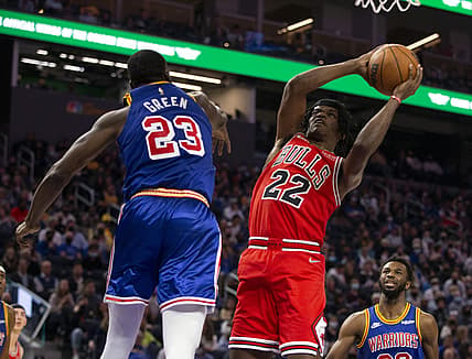 Nov 12, 2021; San Francisco, California, USA; Chicago Bulls forward Alize Johnson (22) shoots around Golden State Warriors forward Draymond Green (23) during the second quarter at Chase Center. Mandatory Credit: D. Ross Cameron-USA TODAY Sports