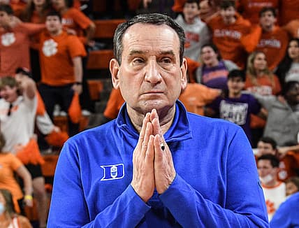 Duke head coach Mike Krzyzewski thanks the crowd as the announcer honors him before tipoff at Littlejohn Coliseum on Feb. 10.

Ncaa Basketball Duke At Clemson