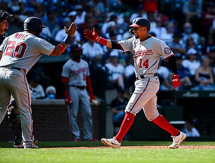 Aug 24, 2022; Seattle, Washington, USA;  Washington Nationals catcher Keibert Ruiz (20) greets third baseman Ildemaro Vargas (14) after Vargas hit a two run home run against the Seattle Mariners during the ninth inning at T-Mobile Park. The Nationals beat the Mariners 3-1.  Mandatory Credit: Lindsey Wasson-USA TODAY Sports