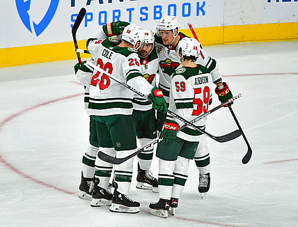 May 24, 2021; Las Vegas, Nevada, USA; Minnesota Wild players celebrate a goal scored by Minnesota Wild left wing Kirill Kaprizov (97) during the first period against the Vegas Golden Knights in game five of the first round of the 2021 Stanley Cup Playoffs at T-Mobile Arena. Mandatory Credit: Stephen R. Sylvanie-USA TODAY Sports