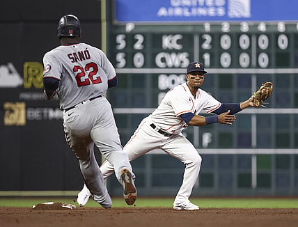 Aug 5, 2021; Houston, Texas, USA; Minnesota Twins first baseman Miguel Sano (22) is forced out as Houston Astros shortstop Robel Garcia (9) steps on second base during the sixth inning at Minute Maid Park. Mandatory Credit: Troy Taormina-USA TODAY Sports