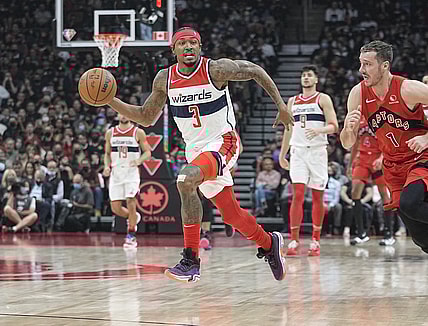 Oct 20, 2021; Toronto, Ontario, CAN; Washington Wizards guard Bradley Beal (3) dribbles away from Toronto Raptors guard Goran Dragic (1) during the first half at Scotiabank Arena. Mandatory Credit: John E. Sokolowski-USA TODAY Sports
