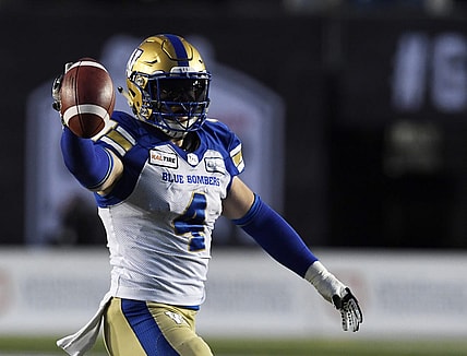 Nov 24, 2019; Calgary, Alberta, CAN; Winnipeg Blue Bombers linebacker Adam Bighill (4) celebrates after recovering a fumble against the Winnipeg Blue Bombers in the first half during the 107th Grey Cup championship football game at McMahon Stadium. Mandatory Credit: Eric Bolte-USA TODAY Sports