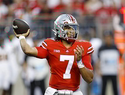 Sep 17, 2022; Columbus, Ohio, USA;  Ohio State Buckeyes quarterback C.J. Stroud (7) drops to throw during the first quarter against the Toledo Rockets at Ohio Stadium. Mandatory Credit: Joseph Maiorana-USA TODAY Sports
