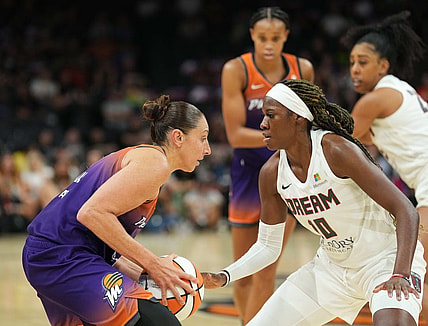 Aug 3, 2023; Phoenix, Arizona, USA; Atlanta Dream guard Rhyne Howard (10) plays defense against Phoenix Mercury guard Diana Taurasi (3) during the game at at Footprint Center. Mandatory Credit: Joe Camporeale-USA TODAY Sports