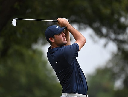 Aug 13, 2023; Memphis, Tennessee, USA; Scottie Scheffler watches his tee shot on the eighth hole during the final round of the FedEx St. Jude Championship golf tournament. Mandatory Credit: Christopher Hanewinckel-USA TODAY Sports