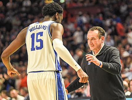 Duke University Head Coach Mike Krzyzewski hugs Duke University center Mark Williams (15) in the closing seconds of a 85-76 win over Michigan State University during the second half of the NCAA Div. 1 Men's Basketball Tournament preliminary round game at Bon Secours Wellness Arena in Greenville, S.C. Sunday, March 20, 2022.

Ncaa Men S Basketball Second Round Duke Vs Michigan State