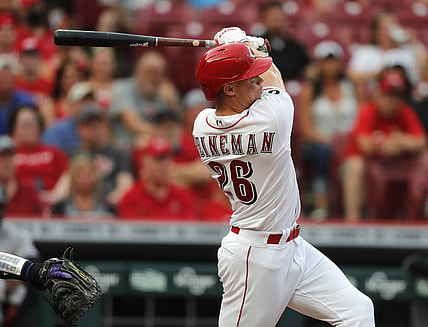 Jun 11, 2021; Cincinnati, Ohio, USA; Cincinnati Reds center fielder Scott Heineman (26) hits a two-run home run against the Colorado Rockies during the second inning at Great American Ball Park. Mandatory Credit: David Kohl-USA TODAY Sports