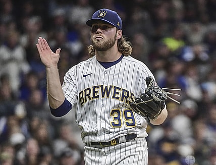 Sep 25, 2021; Milwaukee, Wisconsin, USA; Milwaukee Brewers pitcher Corbin Burnes (39) reacts after striking out New York Mets shortstop Francisco Lindor (not pictured) to end the fifth inning at American Family Field. Mandatory Credit: Benny Sieu-USA TODAY Sports