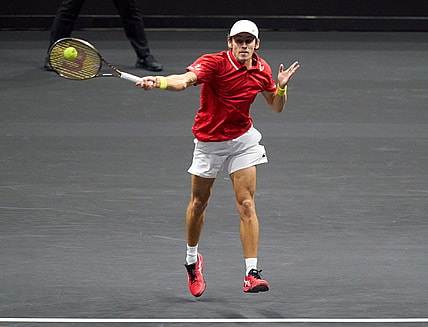 Sep 23, 2022; London, United Kingdom;  Alex De Minaur (AUS) plays a shot against Andy Murray (GBR) in his Laver Cup tennis match.  Mandatory Credit: Peter van den Berg-USA TODAY Sports