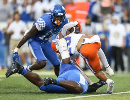 Kentucky's Joshua Paschal tackles Florida's Malik Davis for a loss Saturday night at Kroger Field in Lexington. Oct. 2, 2021

Kentucky Vs Florida October 2021