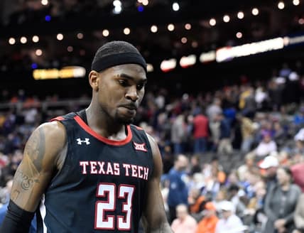 Texas Tech's guard De'Vion Harmon (23) walks off the court after the game against West Virginia in the first round of the Big 12 basketball tournament, Wednesday, March 8, 2023, at T-Mobile Center in Kansas City, Mo.