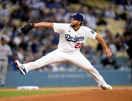 Apr 18, 2023; Los Angeles, California, USA; Los Angeles Dodgers starting pitcher Clayton Kershaw (22) throws in the first inning against the New York Mets at Dodger Stadium. Mandatory Credit: Jayne Kamin-Oncea-USA TODAY Sports