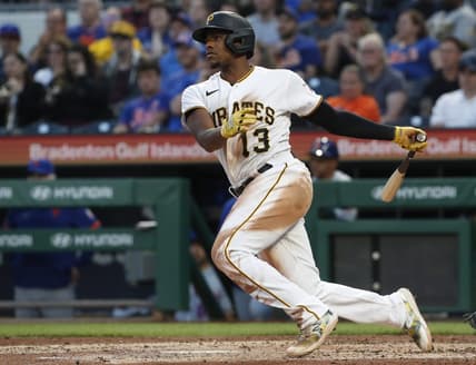 Jun 9, 2023; Pittsburgh, Pennsylvania, USA;  Pittsburgh Pirates third baseman Ke'Bryan Hayes (13) hits a two run double against the New York Mets during the fourth inning at PNC Park. Mandatory Credit: Charles LeClaire-USA TODAY Sports