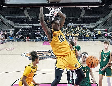 Nov 22, 2022; Kansas City, MO, USA; Wichita State Shockers guard Jaykwon Walton (10) dunks the ball against the San Francisco Dons during the second half at T-Mobile Center. Mandatory Credit: Denny Medley-USA TODAY Sports