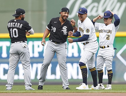 Jul 23, 2021; Milwaukee, Wisconsin, USA;  Chicago White Sox first baseman Jose Abreu (79) and Milwaukee Brewers right fielder Avisa l Garc a (24) meet before the game at American Family Field. Mandatory Credit: Jeff Hanisch-USA TODAY Sports