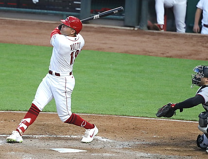 Aug 19, 2021; Cincinnati, Ohio, USA; Cincinnati Reds first baseman Joey Votto (19) hits a three-run home run against the Miami Marlins during the fourth inning at Great American Ball Park. Mandatory Credit: David Kohl-USA TODAY Sports
