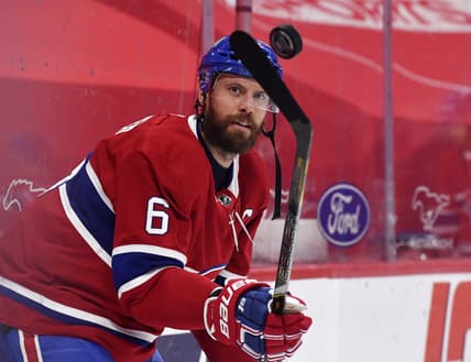 Apr 14, 2021; Montreal, Quebec, CAN; Montreal Canadiens defenseman Shea Weber (6) juggles a puck during the warmup period before the game against the Calgary Flames at the Bell Centre. Mandatory Credit: Eric Bolte-USA TODAY Sports