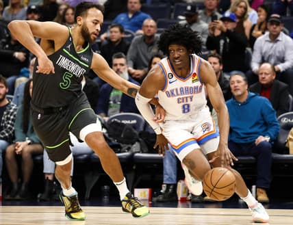 Dec 3, 2022; Minneapolis, Minnesota, USA; Oklahoma City Thunder forward Jalen Williams (8) dribbles the ball against Minnesota Timberwolves forward Kyle Anderson (5) during the second quarter at Target Center. Mandatory Credit: Matt Krohn-USA TODAY Sports