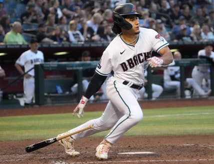 Arizona Diamondbacks    Alek Thomas (5) hits a triple against the Washington Nationals at Chase Field on May 6, 2023.