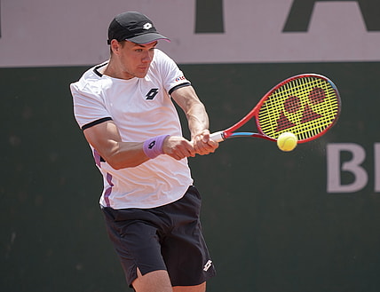Jun 2, 2021; Paris, France;  Kamil Majchrzak (POL) in action during his match against Casper Ruud (NOR) on day four of the French Open at Stade Roland Garros. Mandatory Credit: Susan Mullane-USA TODAY Sports