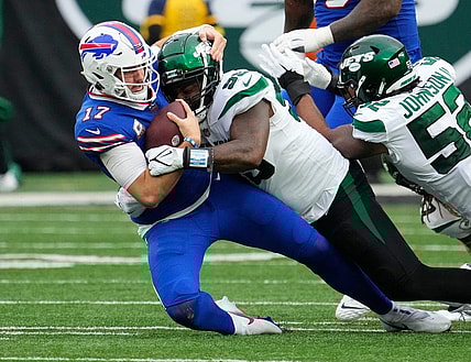 Nov 6, 2022; East Rutherford, NJ, USA; New York Jets defensive end Vinny Curry (99) tackles Buffalo Bills quarterback Josh Allen (17) in the second half at MetLife Stadium. Mandatory Credit: Robert Deutsch-USA TODAY Sports