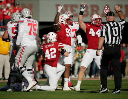 Nebraska Cornhuskers defensive lineman Damion Daniels (93) and Nebraska Cornhuskers linebacker Garrett Nelson (44) celebreate after teammate Nebraska Cornhuskers linebacker Caleb Tannor (2) sacked Ohio State Buckeyes quarterback C.J. Stroud (7) Saturday's NCAA Division I football game at Memorial Stadium in Lincoln, Neb., on November 6, 2021.

Osu21neb Bjp 185
