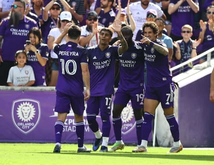 Feb 27, 2022; Orlando, Florida, USA; Orlando City SC forward Benji Michel (19) celebrates with forward Alexandre Pato (7) as he scores a goal against the CF Montr  al during the second half at Orlando City Stadium. Mandatory Credit: Kim Klement-USA TODAY Sports