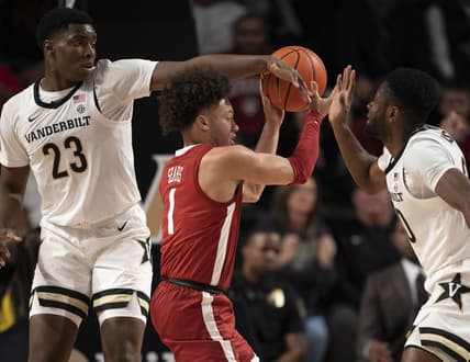 Jan 17, 2023; Nashville, Tennessee, USA; Alabama guard Mark Sears (1) tries to get past Vanderbilt forward Malik Dia (23) and forward Emmanuel Ansong (20) during the first half at Memorial Gymnasium. Mandatory Credit: George Walker IV-USA TODAY Sports