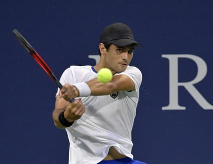 Aug 8, 2022; Montreal, QC, Canada; Marcos Giron (USA) hits a backhand against Roberto Bautista Agut (ESP) (not pictured) in first round play in the National Bank Open at IGA Stadium. Mandatory Credit: Eric Bolte-USA TODAY Sports