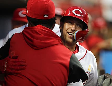 Sep 2, 2022; Cincinnati, Ohio, USA; Cincinnati Reds third baseman Spencer Steer celebrates in the dugout after hitting a solo home run, his first major league home run, against the Colorado Rockies during the fifth inning at Great American Ball Park. Mandatory Credit: David Kohl-USA TODAY Sports