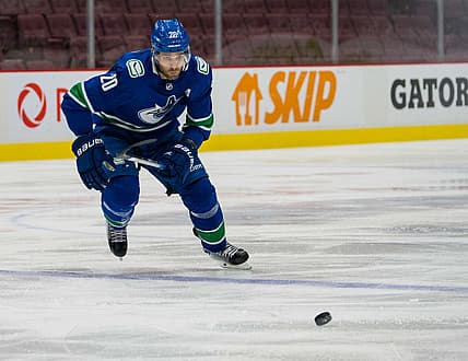 Apr 18, 2021; Vancouver, British Columbia, CAN;  Vancouver Canucks forward Brandon Sutter (20) skates against the Toronto Maple Leafs at Rogers Arena. Canucks won 3- 2 in Overtime. Mandatory Credit: Bob Frid-USA TODAY Sports