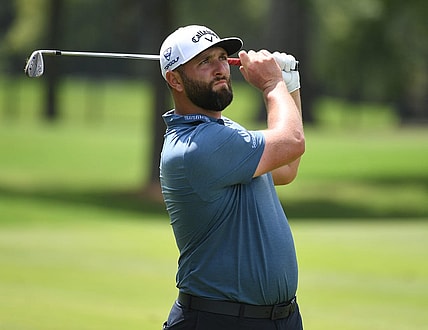 Aug 11, 2023; Memphis, Tennessee, USA; Jon Rahm watches his second shot on the ninth hole during the second round of the FedEx St. Jude Championship golf tournament. Mandatory Credit: Christopher Hanewinckel-USA TODAY Sports