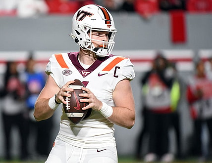 Oct 27, 2022; Raleigh, North Carolina, USA; Virginia Tech Hokies quarterback Grant Wells (6) drops back to pass during the first half against the North Carolina State Wolfpack at Carter-Finley Stadium. Mandatory Credit: Rob Kinnan-USA TODAY Sports
